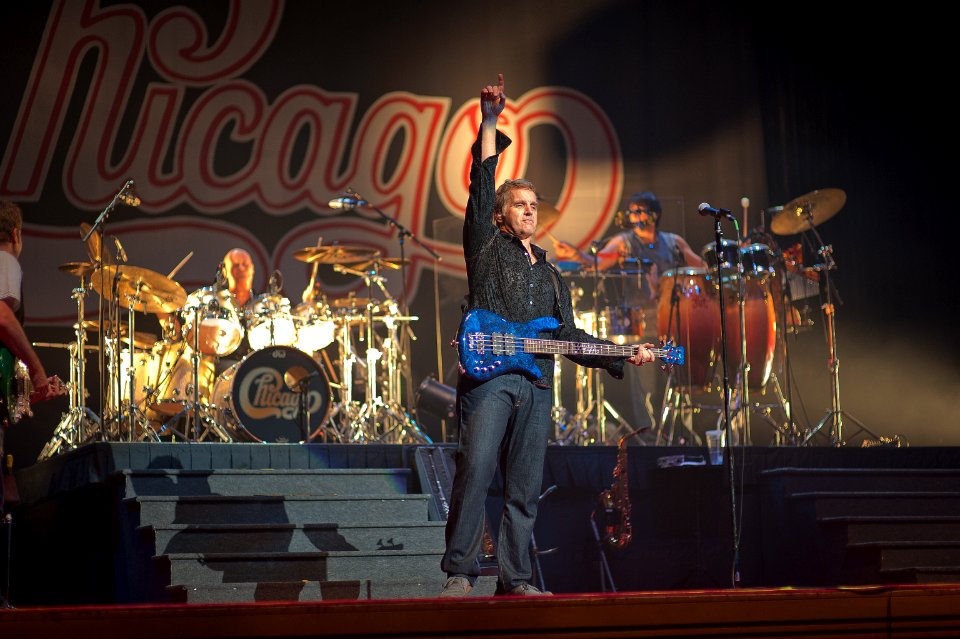 Man Holding Electric Guitar On Stage