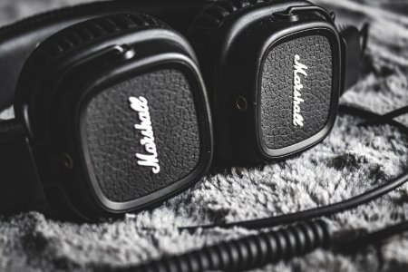 Grayscale Photography Of Black Marshall Headphones photo