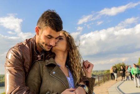 Woman Kissing Man