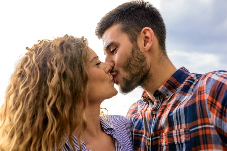 Woman And Man Kissing Each Other photo
