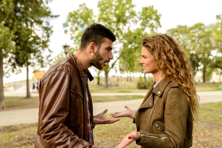 Man And Woman Wearing Brown Leather Jackets photo
