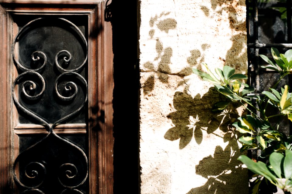 Brown And Black Wooden Window Pane