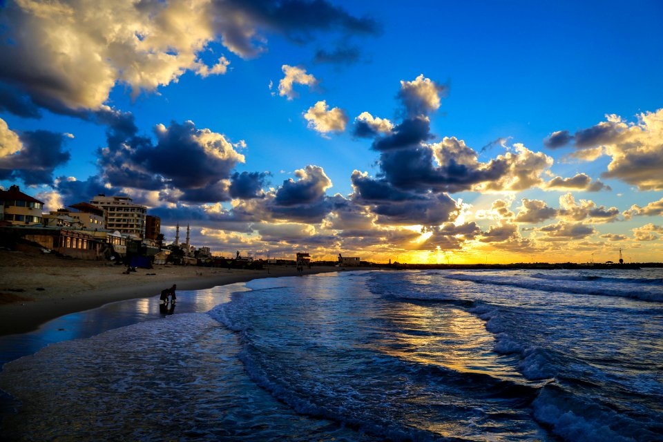 Photography Of Seashore During Dusk