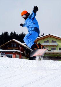 Person Doing Snowboarding