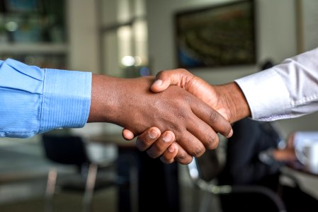 Two Person In Long-sleeved Shirt Shakehand photo