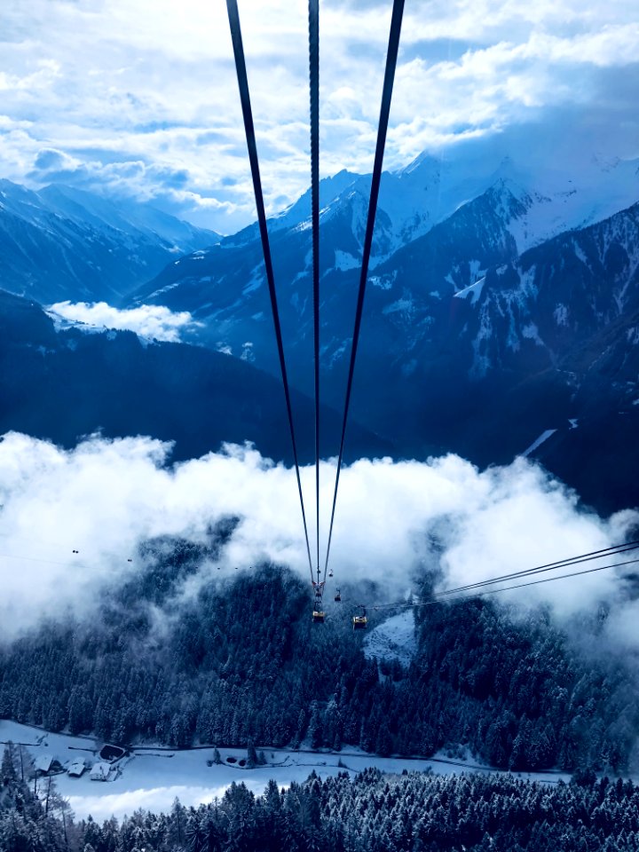 Cable Car Under White Clouds