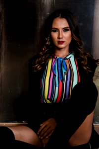Photo Of Woman Wearing Multi-colored Top