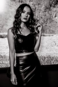 Monochrome Photography Of Woman Wearing Black Leather Strapless Crop Top And Black Pencil Skirt photo
