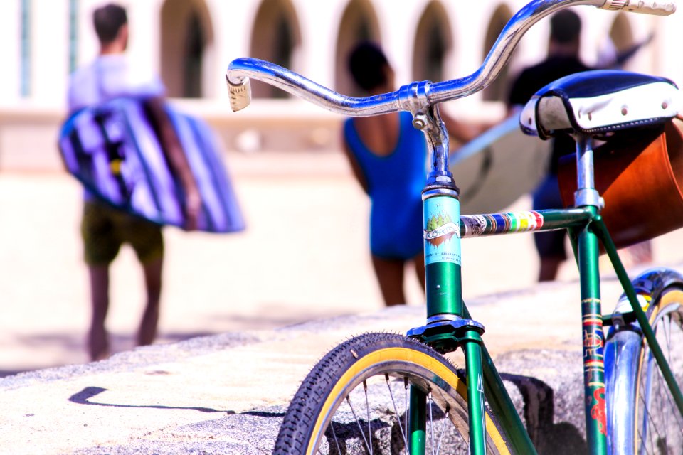 Selective Focus Photography Of Green Bike