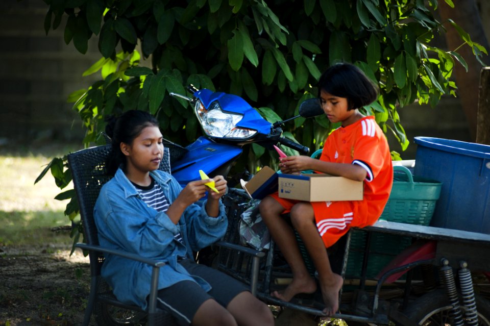 Two Girls Doning Hand Crafts