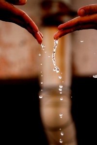 Hands With Drops Of Water photo