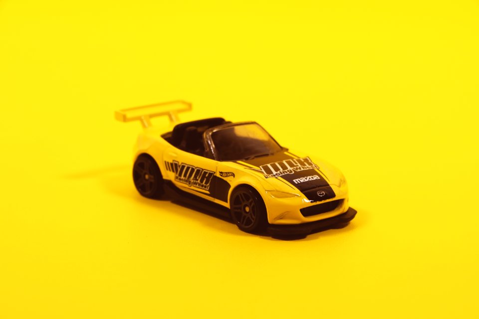 Yellow And Black Toy Car Model