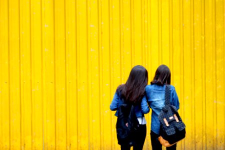 Two Women In Denim Jackets photo