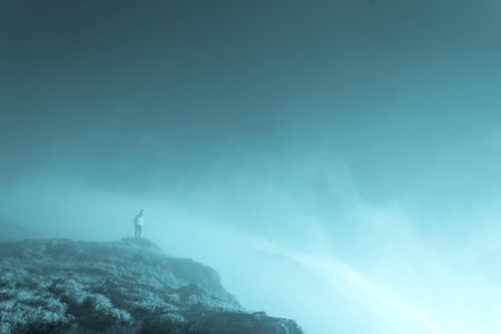People Standing On Cliff