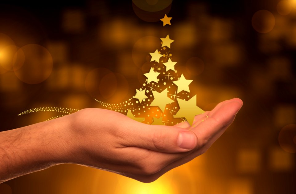 Hand Lighting Christmas Gold