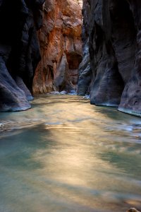 Photo Of Body Of Water Surrounded By Rock Formation photo