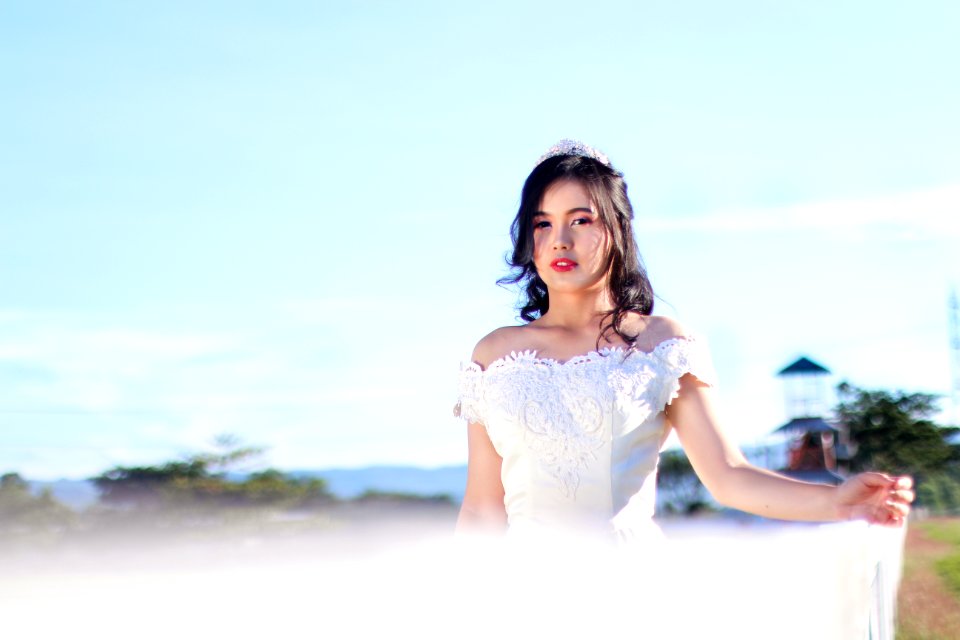 Woman In White Off-shoulder Gown