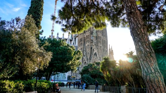 Group Of People Walking In Front Of Sagrada Familia Cathedral photo