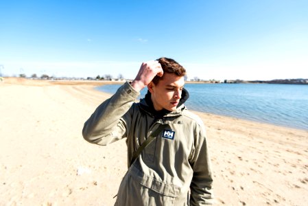 Photography Of A Man On Seashore photo