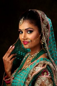 Woman Wearing Green Brown And Pink Sari Dress Portrait Photograph photo