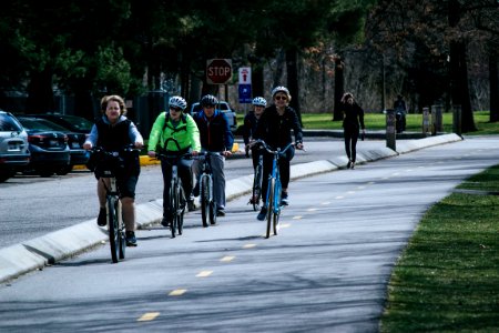 Five Person Riding Bikes photo
