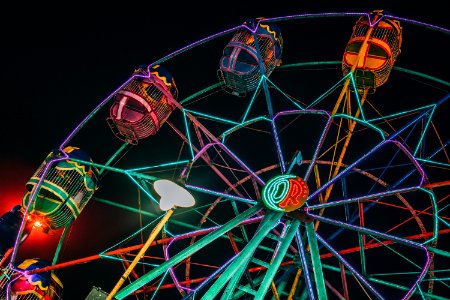 Lighted Ferris Wheel At Night photo