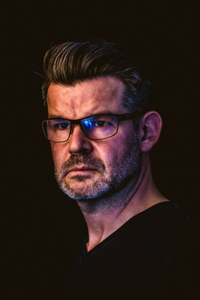 Close-Up Photography Of A Man Wearing Eyeglasses photo