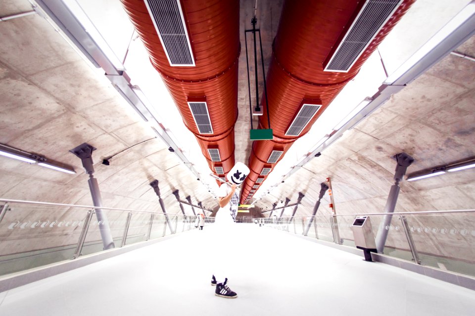 Man Wearing White Shirt And Pants On Tunnel