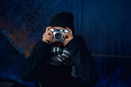 Woman In Grey Jacket Wearing Beanie photo