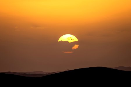 Landscape Photography Silhouette Of Hills During Golden Time photo
