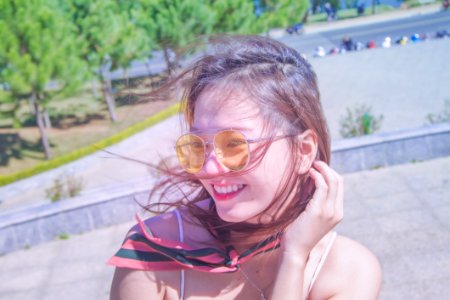 Photography Of A Woman Wearing Eyeglasses photo