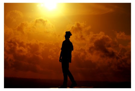 Silhouette Of Man During Sunset photo