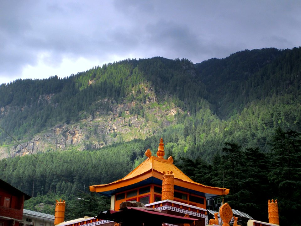 Temple Under Green Forest Mountain