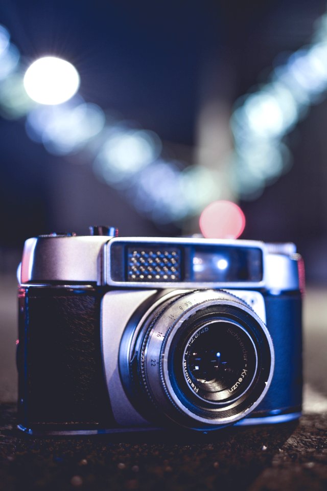 Selective Focus Photo Of Gray And Black Slr Camera