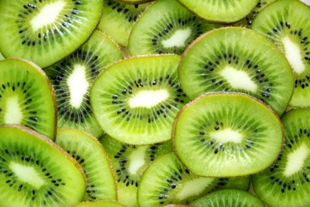 Close-Up Photography Of Sliced Kiwi Fruits photo