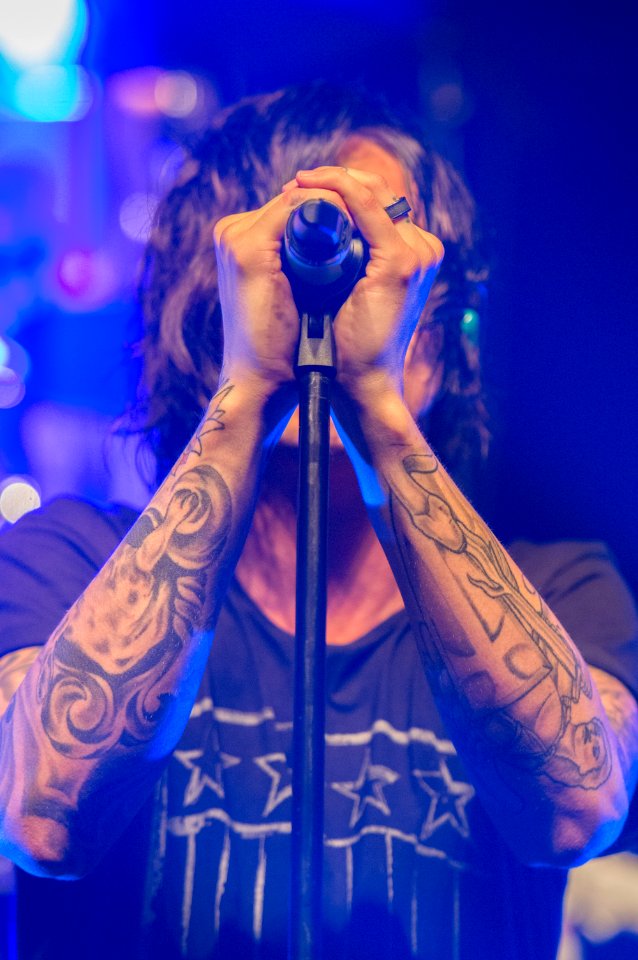 Photo Of Man Holding Microphone