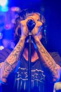 Photo Of Man Holding Microphone