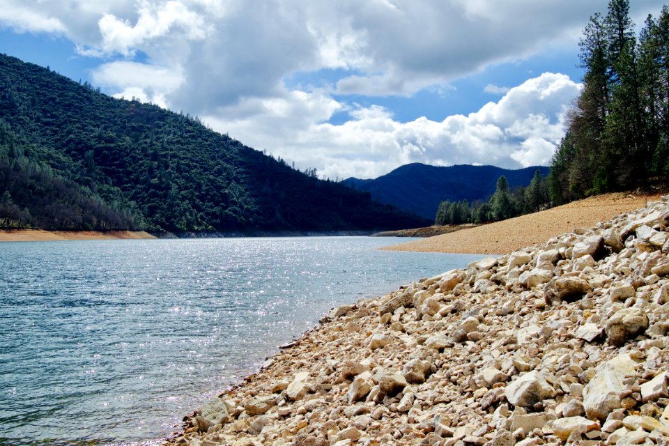 Lake Water Under Cloudy Sunny Sky