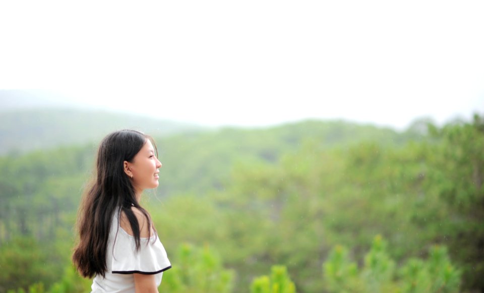 Photo Of Woman Wearing White Top