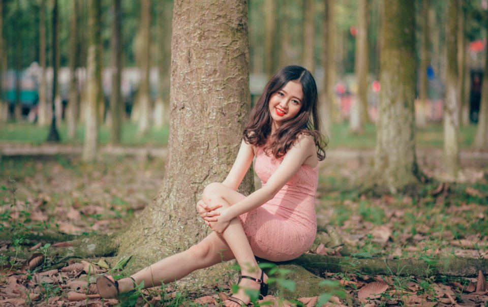 Woman Wearing Pink Sleeveless Dress