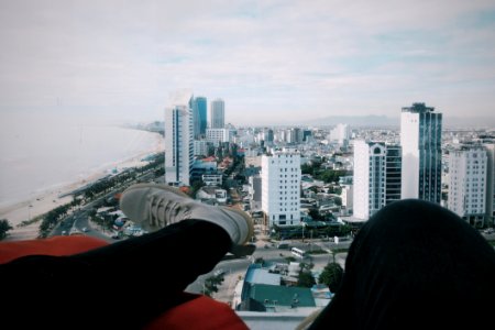 Person Wearing Black Jeans And White Sneakers photo