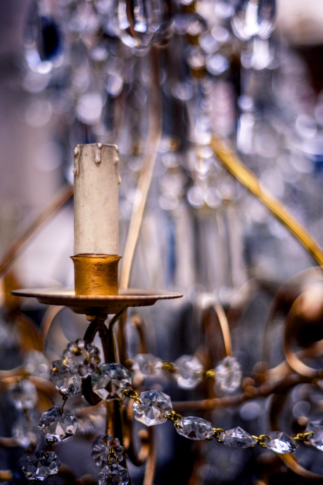 Person Taking Photo Of Brown Steel Chandelier