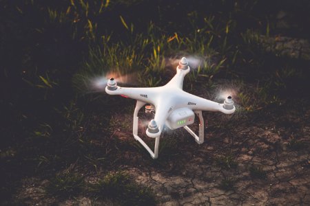 Close-up Photography Of Drone On Grass photo