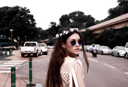 Photography Of A Woman Wearing Vintage Sunglasses photo