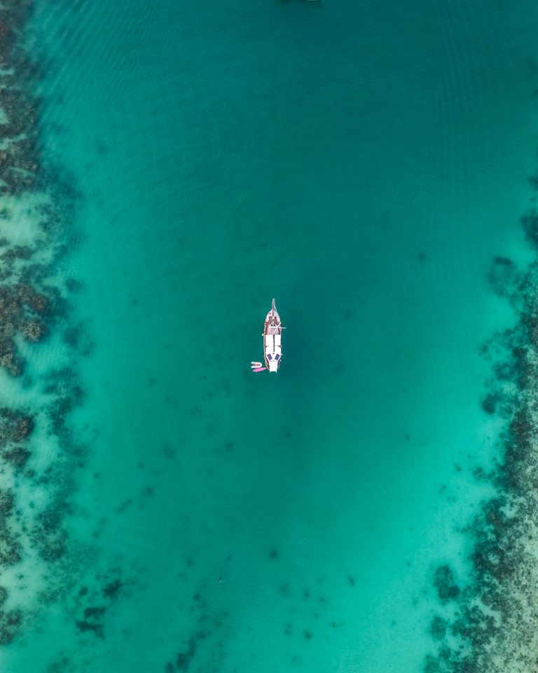 White Boat On Body Of Water
