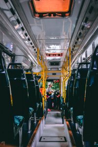 Woman Standing In Bus