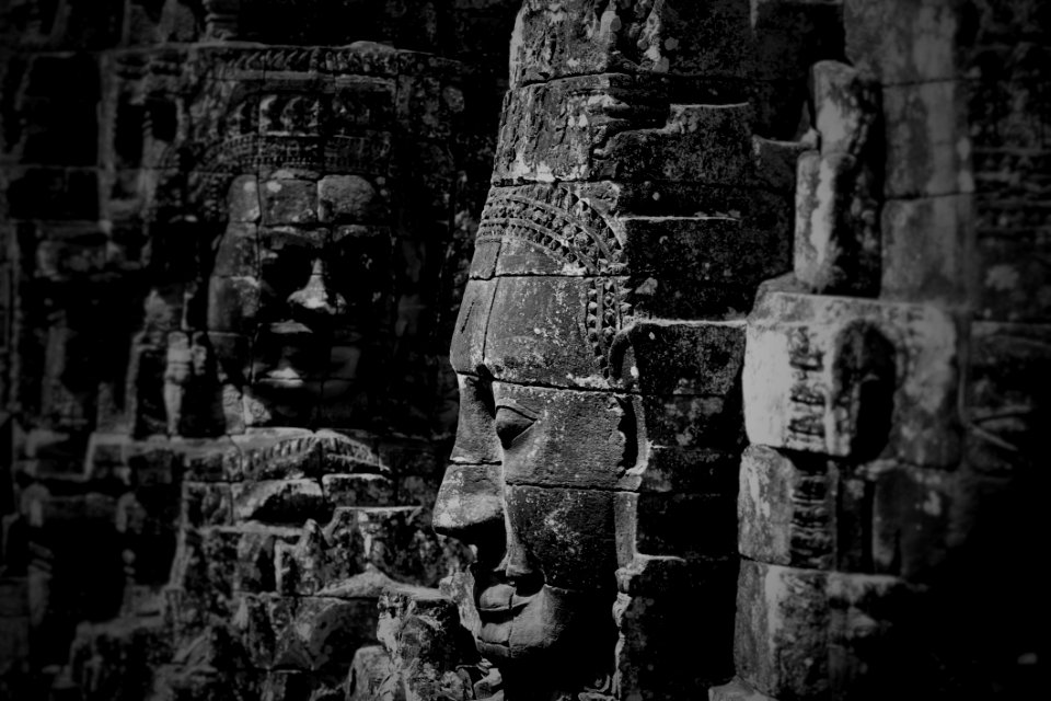 Grayscale Photo Of Buddha Statues