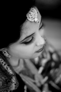 Grayscale Photo Of Woman Wearing Indian Traditional Dress photo
