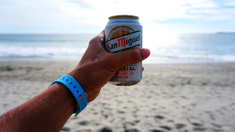 Person Holding San Miguel Beer Tin Can