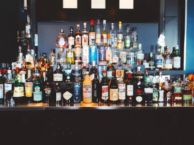 Liquor Bottles On Shelf photo